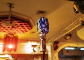 vintage-professional-musical-equipment-retro-style-microphone-restaurant-background